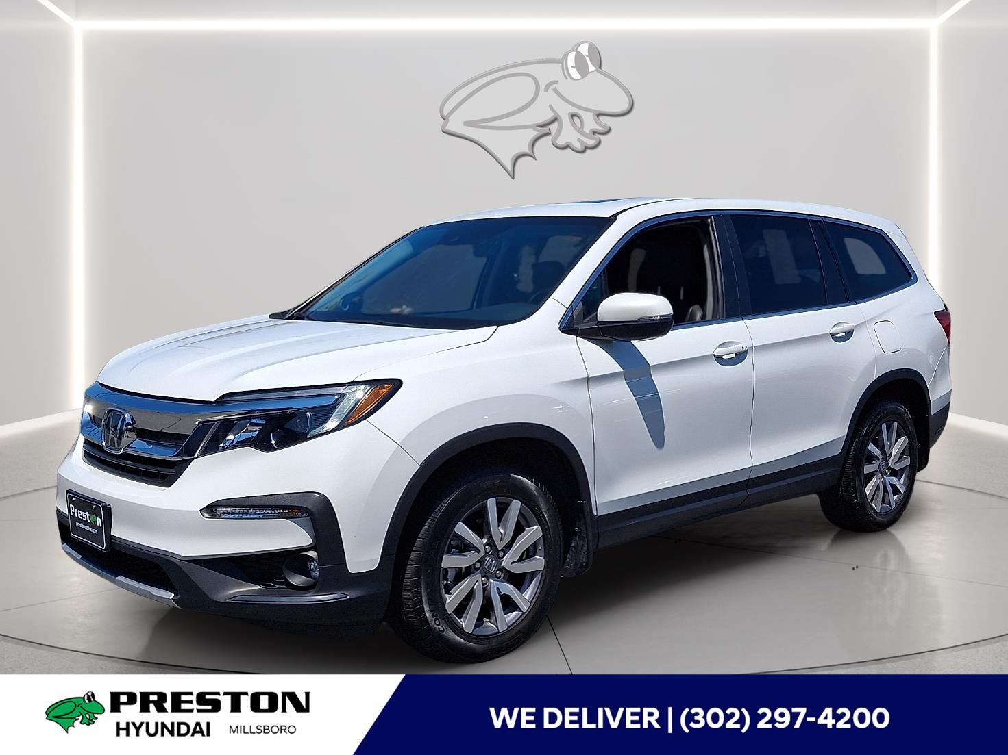 2021 Honda Pilot EX-L in Platinum White Pearl — front three-quarter view