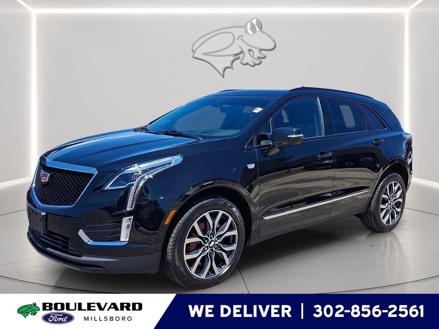 2025 Cadillac XT5 AWD Sport in Stellar Black Metallic — front three-quarter view