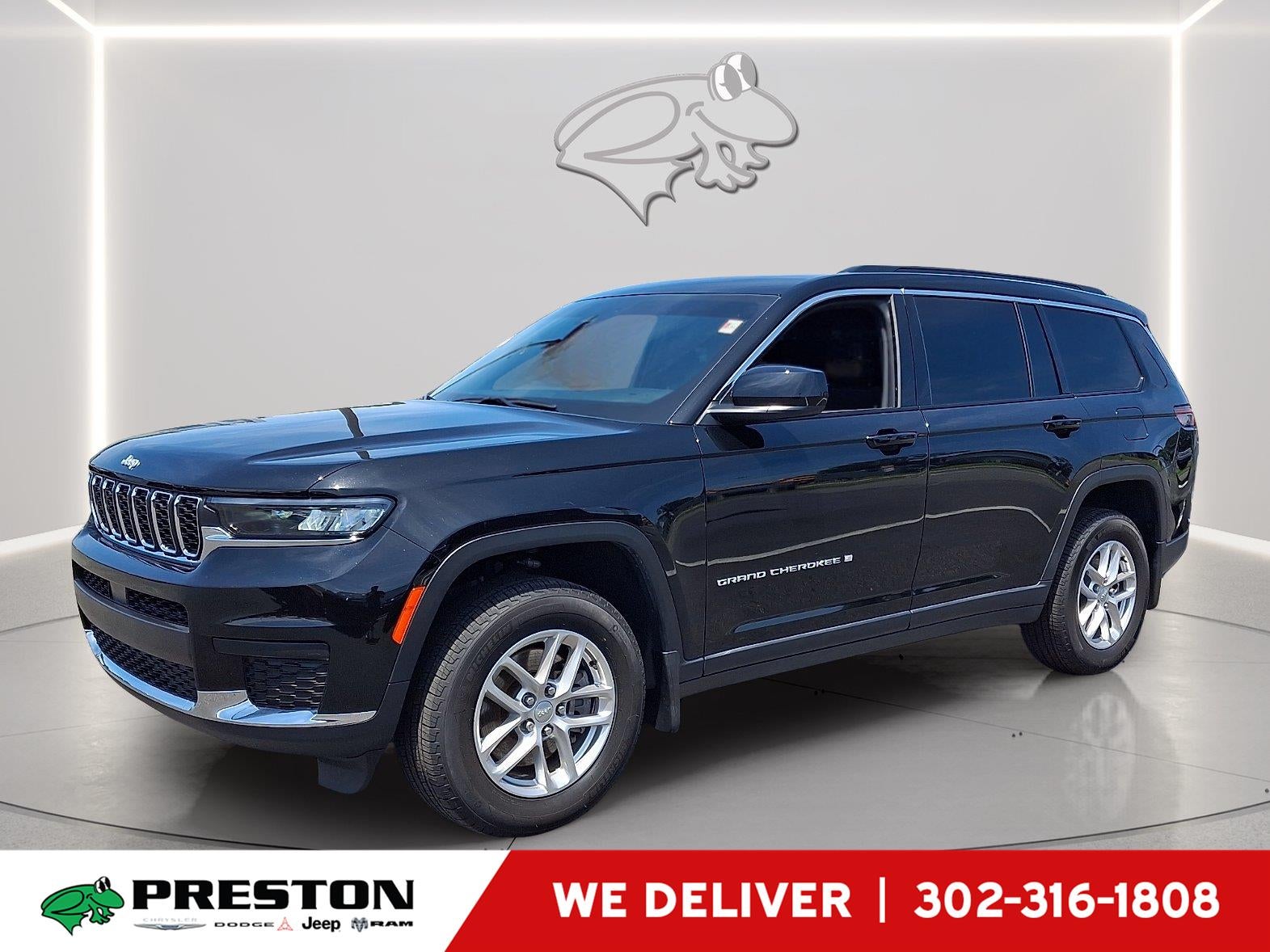 2025 Jeep Grand Cherokee L Laredo X in Diamond Black Crystal Pearlcoat — front three-quarter view