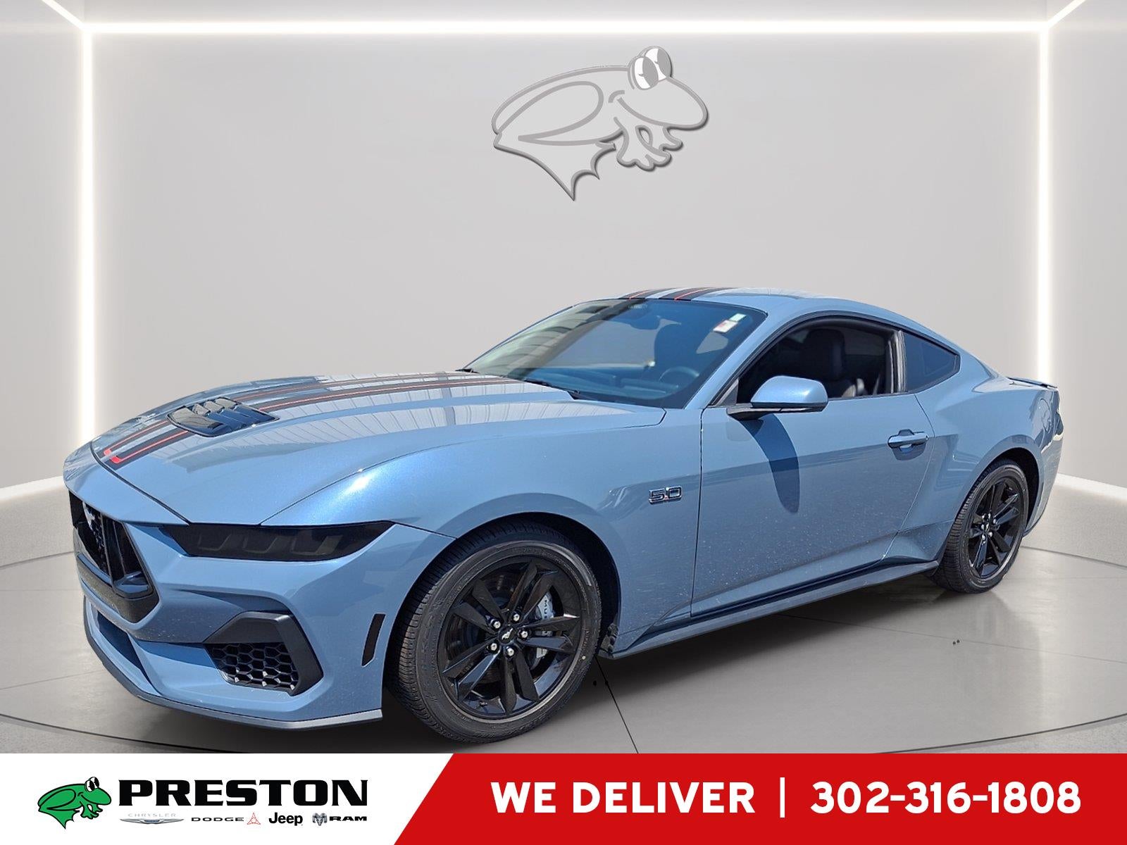 2024 Ford Mustang GT in Vapor Blue — front three-quarter view